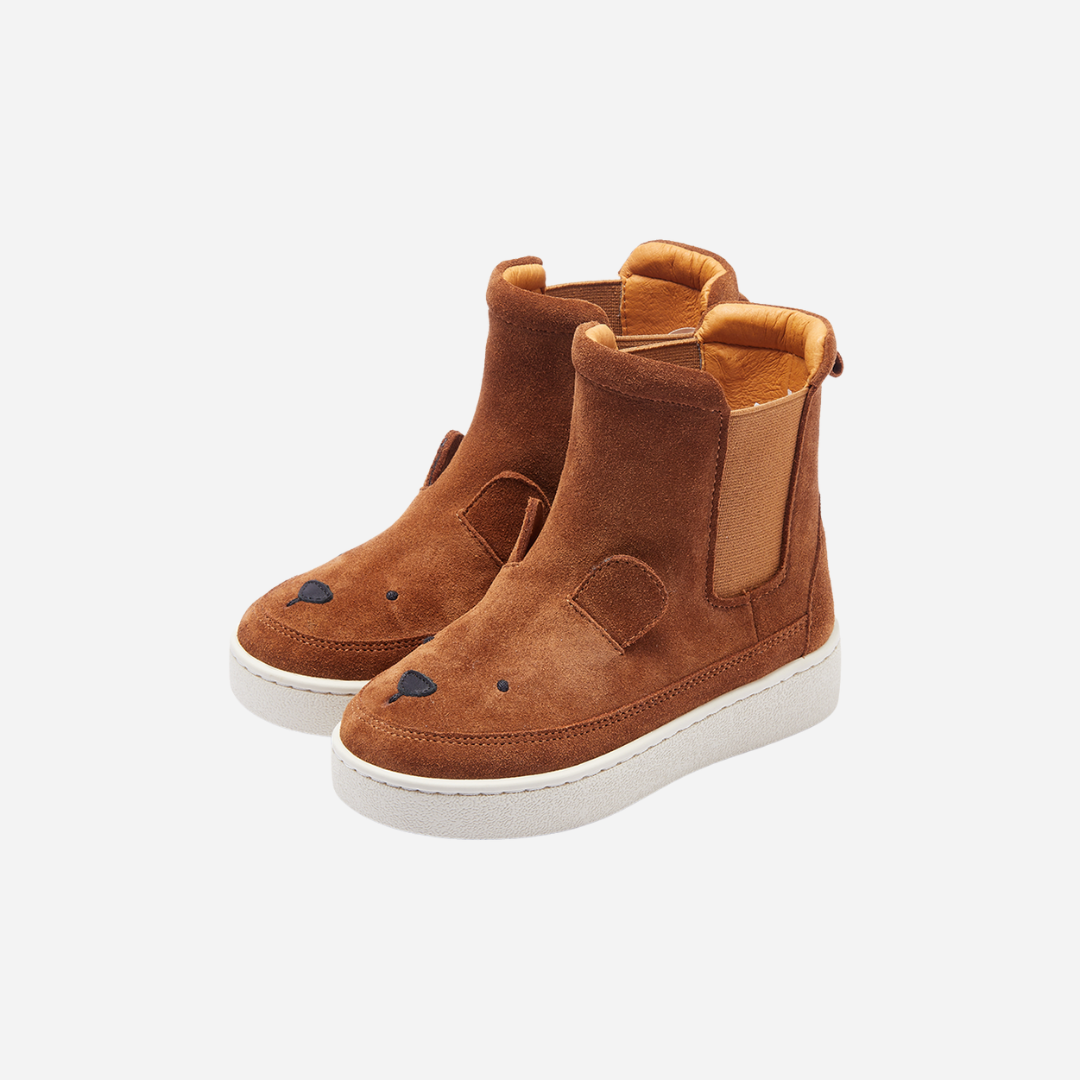 Sold at Bombon shop, designed by Donsje from Amsterdam, these cognac suede bear boots are perfect to keep little toes warm and looking cute! other side view