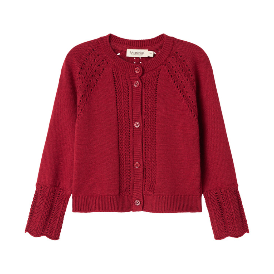 Sold at Bombon shop, designed by MarMar Copenhagen. Deep red knit baby cardigan with scalloped cuffs, pairs perfectly with the red plaid bloomers and embroidered collar bodysuit.
