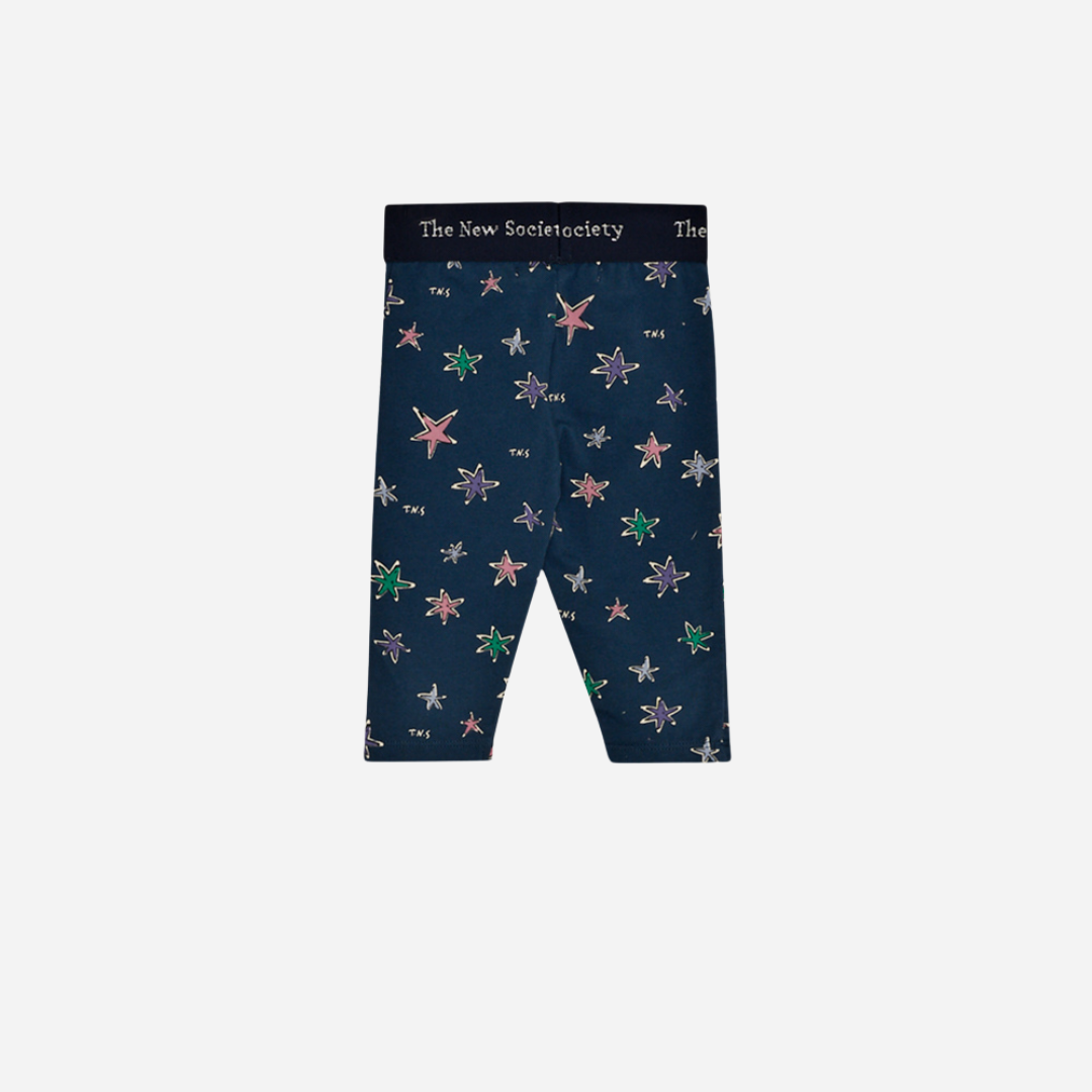 Sold at Bombon shop, these baby girl leggings by The New Society come in a navy jersey fabric with a vibrant star print and a soft elastic logo waistband for a comfy and secure fit. back