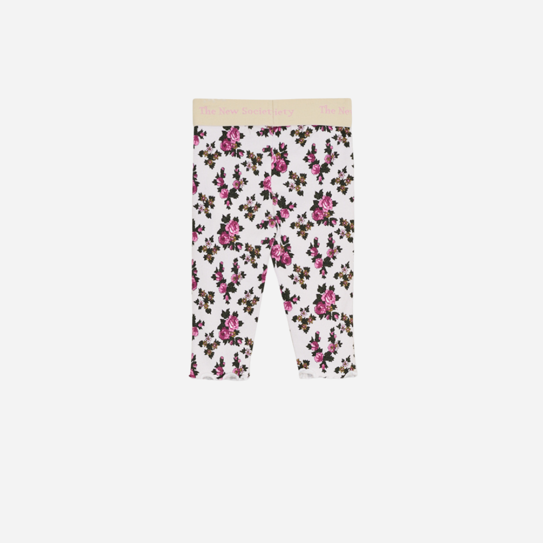 Sold at Bombon shop, designed by The New Society, these baby girl ribbed leggings feature a soft white base with an all-over rose floral print and a comfortable elastic waistband with logo detail. back