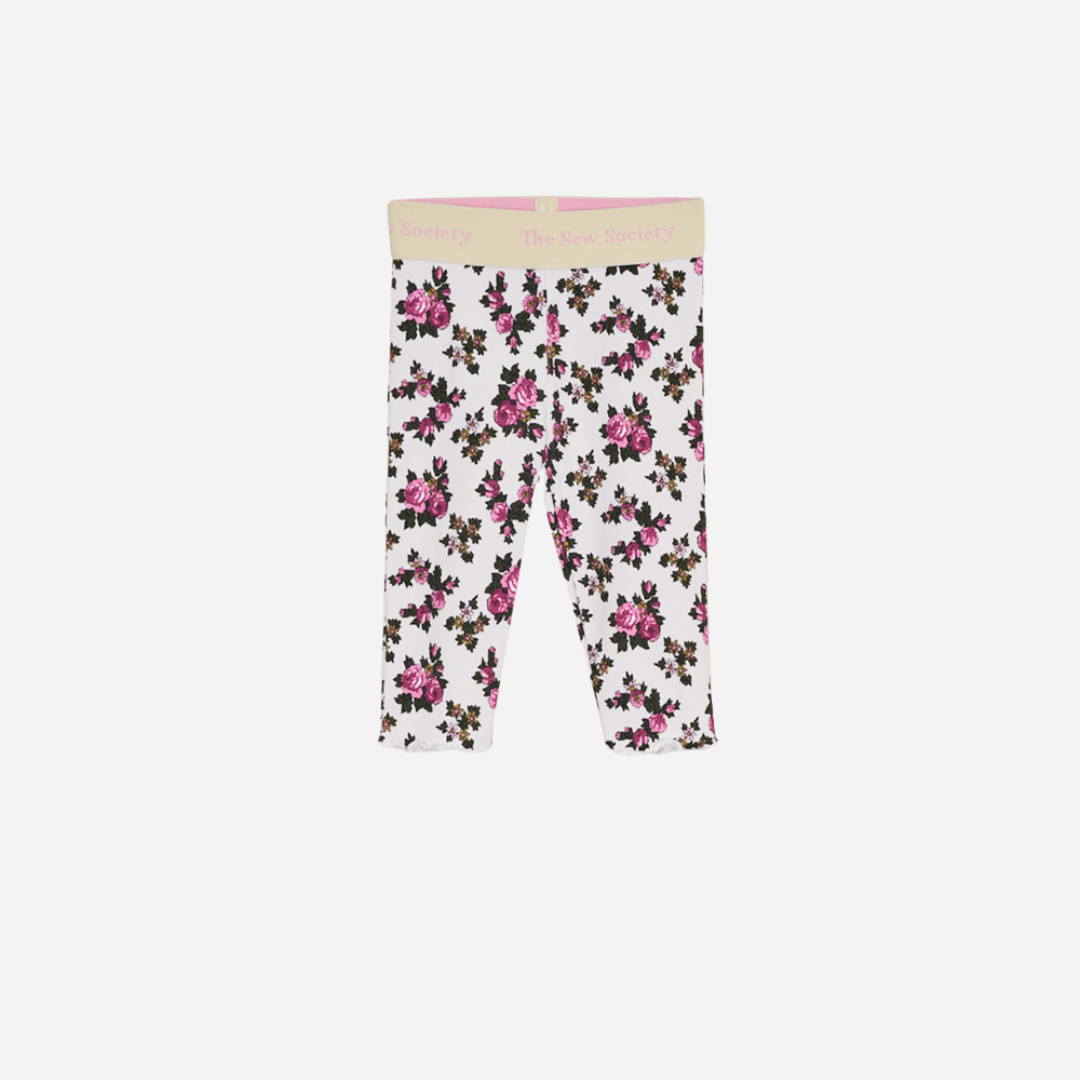 Sold at Bombon shop, designed by The New Society, these baby girl ribbed leggings feature a soft white base with an all-over rose floral print and a comfortable elastic waistband with logo detail. front