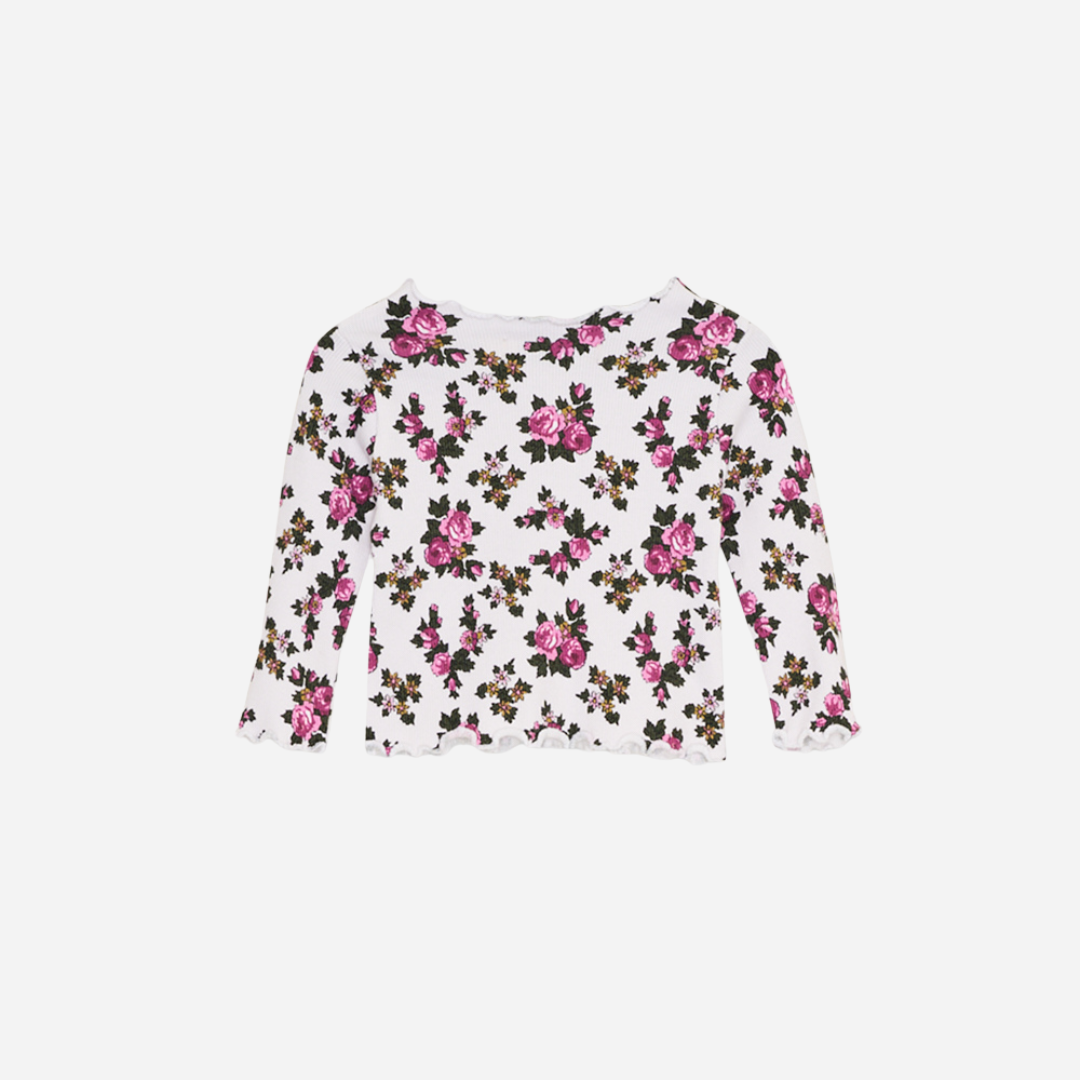 Sold at Bombon shop, designed by The New Society, this baby girl long-sleeve ribbed tee features a rose floral print and delicate lettuce-edge trim. front