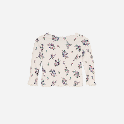 Sold at Bombon shop, this baby and toddler girl ribbed top by The New Society is adorned with a charming floral print and finished with a scalloped neckline and hem—perfect for layering or wearing on its own with matching bottoms. back