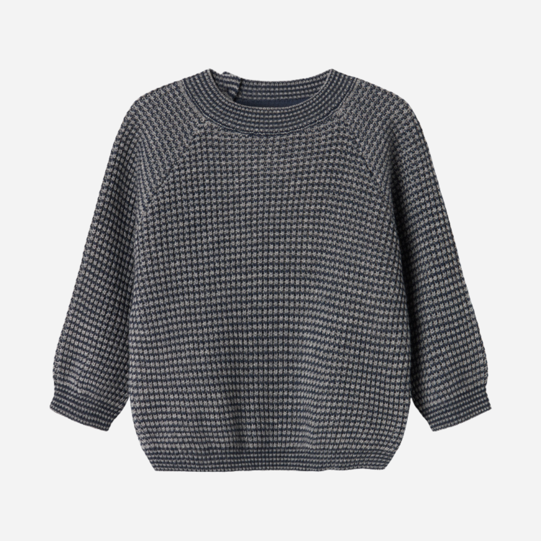 Sold at Bombon shop, designed by MarMar Copenhagen. Blue and beige textured knit baby sweater with shoulder buttons, pairs perfectly with the matching knit pants.