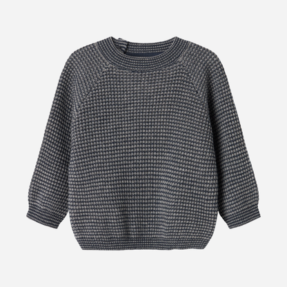 Sold at Bombon shop, designed by MarMar Copenhagen. Blue and beige textured knit baby sweater with shoulder buttons, pairs perfectly with the matching knit pants.