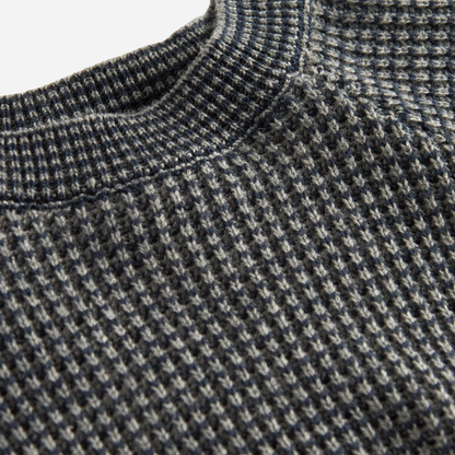 Sold at Bombon shop, designed by MarMar Copenhagen. Blue and beige textured knit baby sweater with shoulder buttons, pairs perfectly with the matching knit pants.