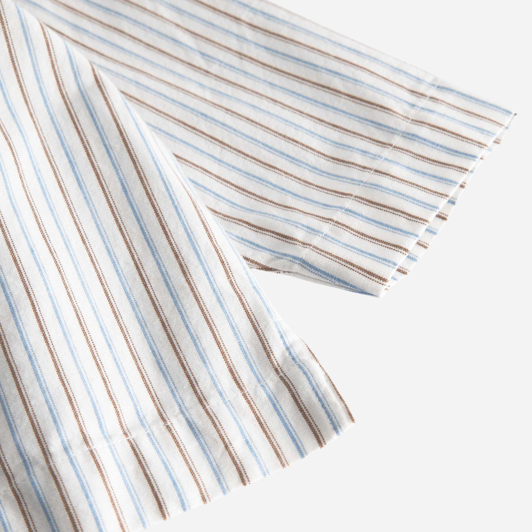 Sold at Bombon shop, designed by Mar Mar Copenhagen, Tovas B baby shirt in Blue Iris Stripe with band collar