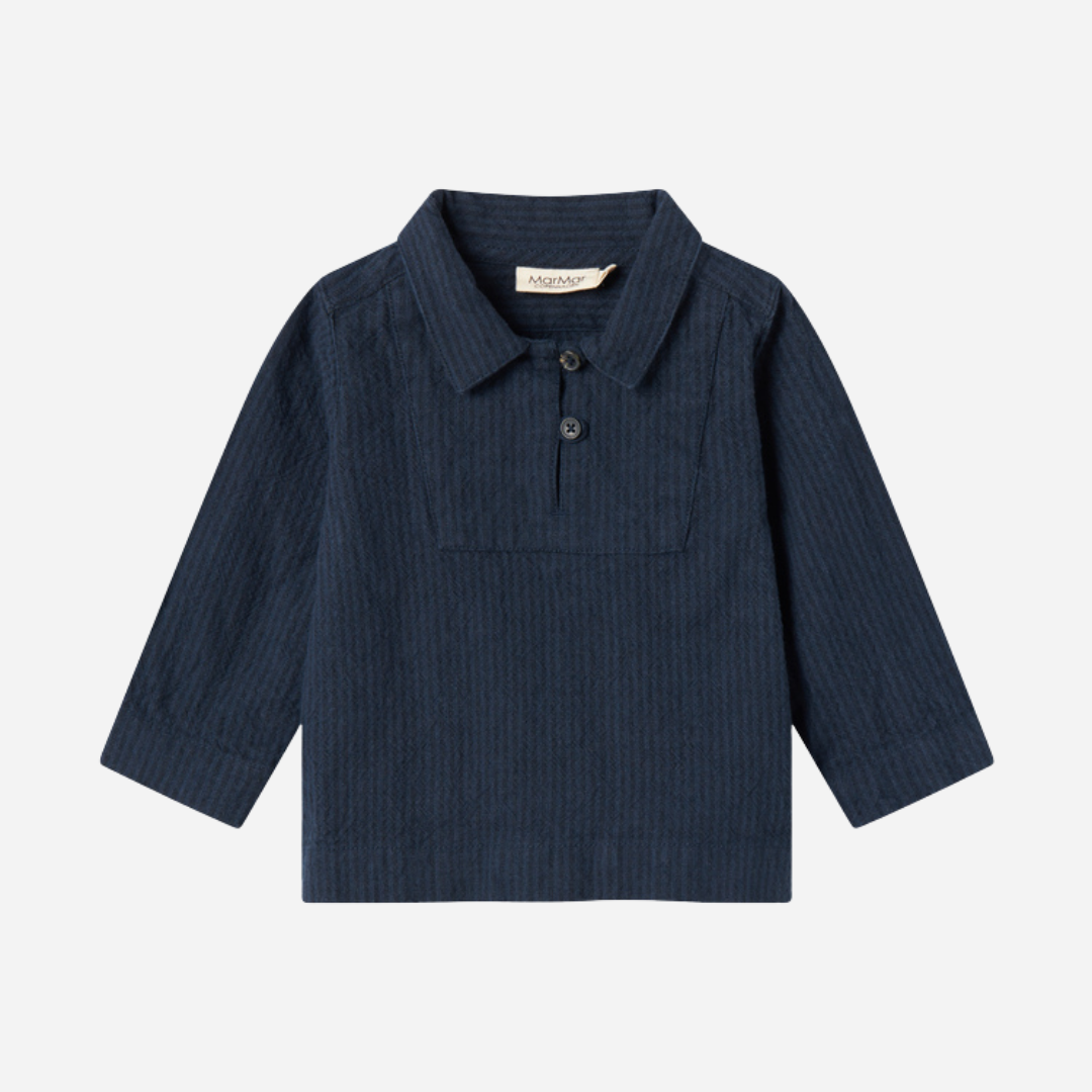 Sold at Bombon shop, designed by MarMar Copenhagen — navy 100% cotton textured long-sleeve baby shirt with buttons, part of a matching set