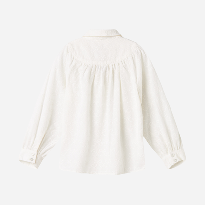 Sold at Bombon shop, designed by MarMar Copenhagen — cream 100% cotton baby blouse with rounded collar and gathered details, pairs perfectly with the navy pinafore dress.