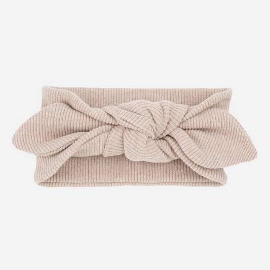Sold at Bombon shop, designed by 1+ in the family – Ursula headband in soft nude ribbed cotton with a knotted bow detail.