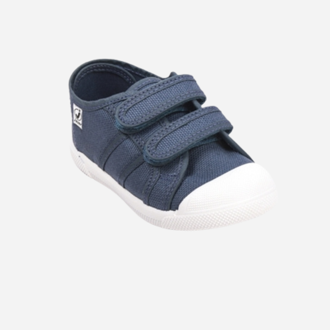sold at Bombon shop, these blue velcro sneakers are Designed for play and everyday wear. The lightweight design and easy velcro straps. 