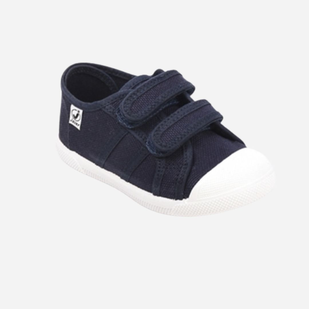 sold at Bombon shop, these navy velcro sneakers are Designed for play and everyday wear. The lightweight design and easy velcro straps. 