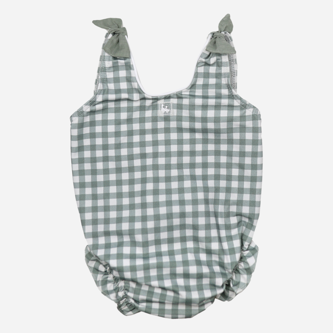 sold at Bombon shop, designed by Al Agua Patos Brand, this vichy print one-piece bathing suit for baby girls is perfect for summer. front view