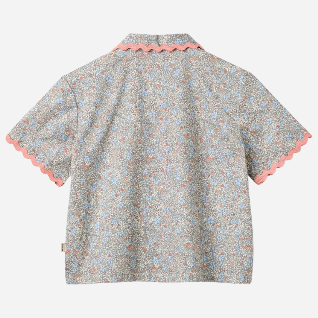 Sold at Bombon Shop, designed by Wheat, air blue flowers organic cotton short sleeve blouse with lace trim and soft blue floral print.