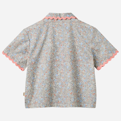 Sold at Bombon Shop, designed by Wheat, air blue flowers organic cotton short sleeve blouse with lace trim and soft blue floral print.