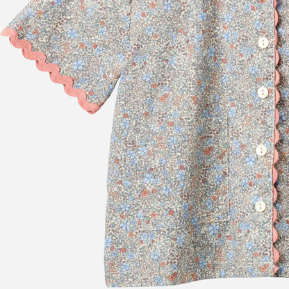 Sold at Bombon Shop, designed by Wheat, air blue flowers organic cotton short sleeve blouse with lace trim and soft blue floral print.