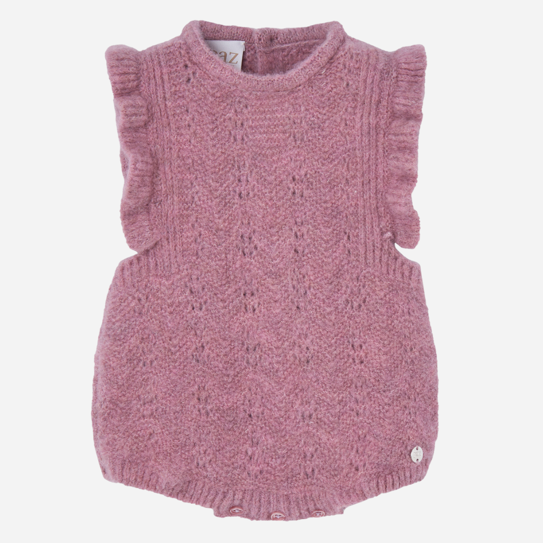 Sold at Bombon shop, designed by Paz Rodriguez, dusty rose knit baby romper with ruffled sleeves and openwork details