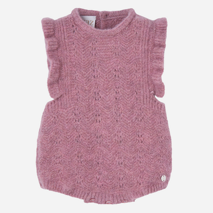 Sold at Bombon shop, designed by Paz Rodriguez, dusty rose knit baby romper with ruffled sleeves and openwork details