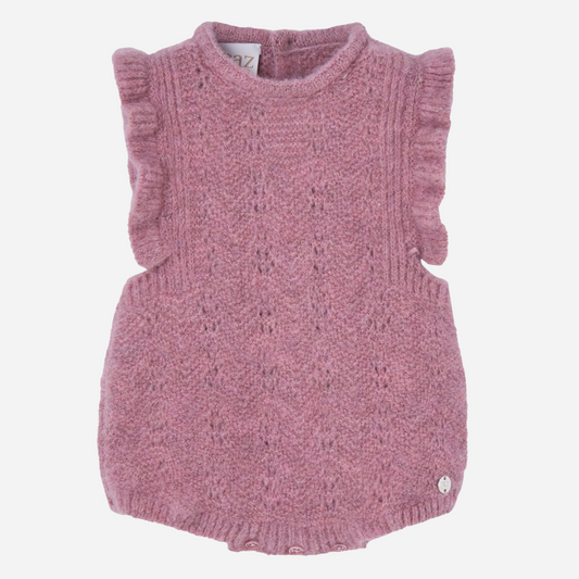 Sold at Bombon shop, designed by Paz Rodriguez, dusty rose knit baby romper with ruffled sleeves and openwork details