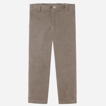 Sold at Bombon shop, designed by Paz Rodriguez, beige corduroy trousers for boys with straight-leg fit and button closure.
