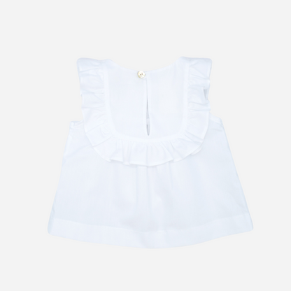 Sold at Bombon shop, designed by Fina Ejerique brand, white embroidered voile blouse is perfect for spring and summer. back view