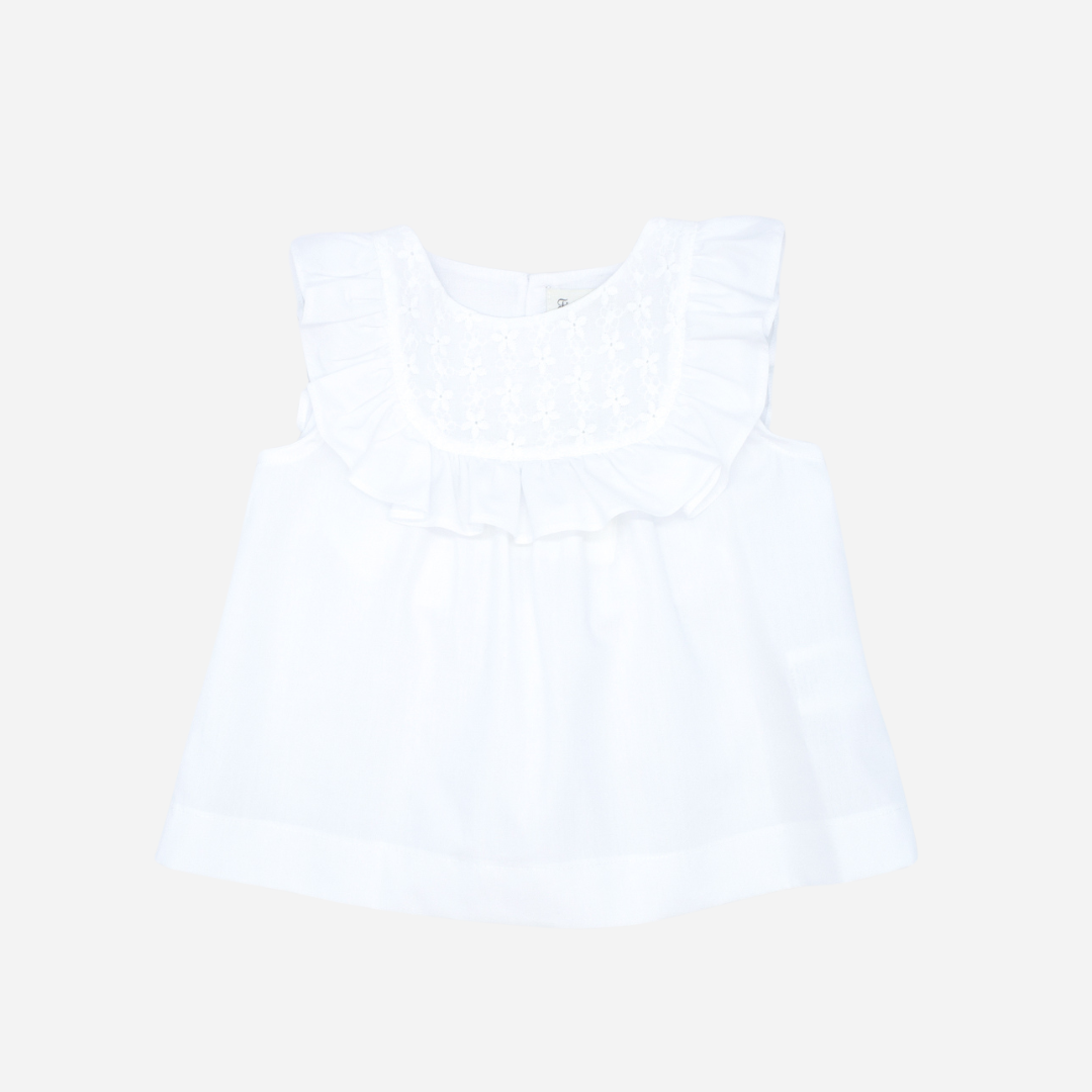 Sold at Bombon shop, designed by Fina Ejerique brand, white embroidered voile blouse is perfect for spring and summer.  front view