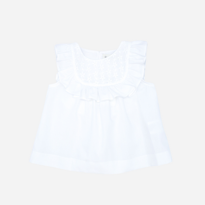 Sold at Bombon shop, designed by Fina Ejerique brand, white embroidered voile blouse is perfect for spring and summer.  front view