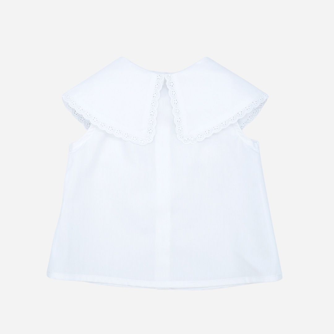 Sold at Bombon shop, designed by Fina Ejerique brand, white poplin collar blouse for babies and toddlers is perfect for spring and summer. back