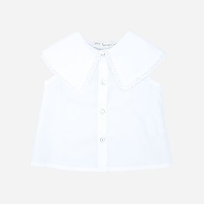 Sold at Bombon shop, designed by Fina Ejerique brand, white poplin collar blouse for babies and toddlers is perfect for spring and summer. front view
