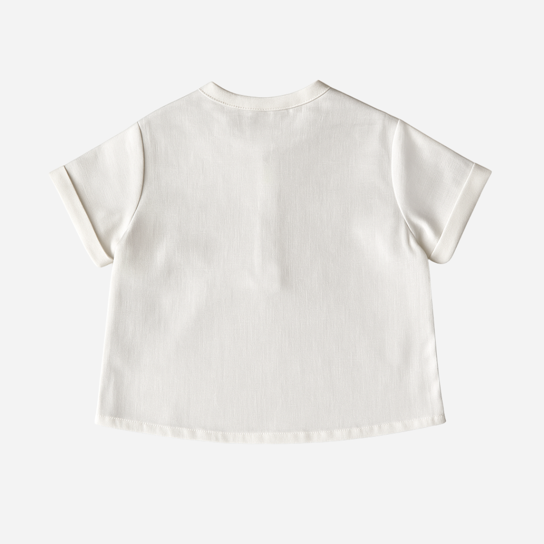 sold at Bombon shop, designed by Paloma de la O brand, this white shirt for baby boys and toddlers is perfect to complete any spring and summer outfit. back view