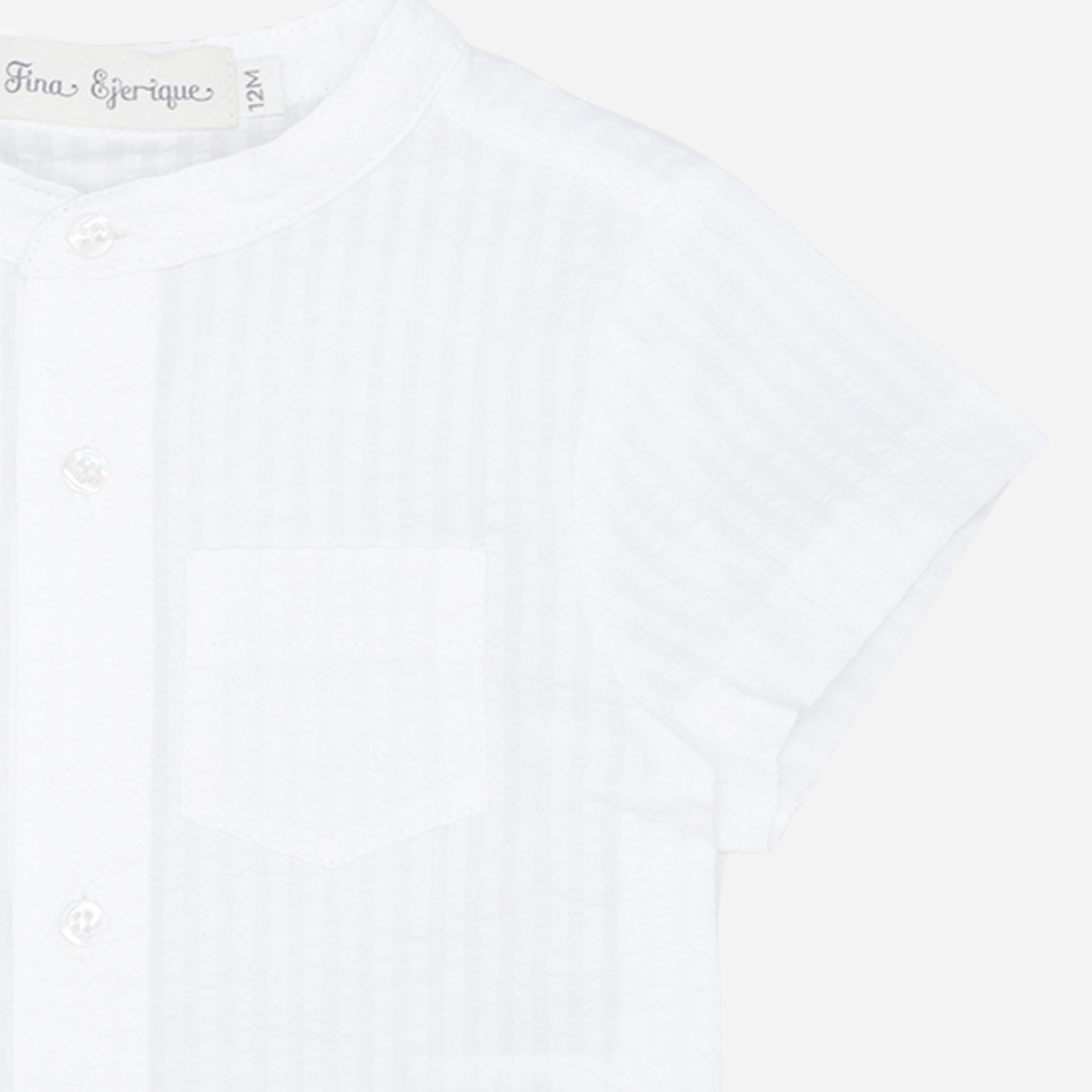 Sold at Bombon shop, designed by Fina Ejerique brand, white short sleeve shirt for babies and toddlers perfect for spring and summer. Zoom view