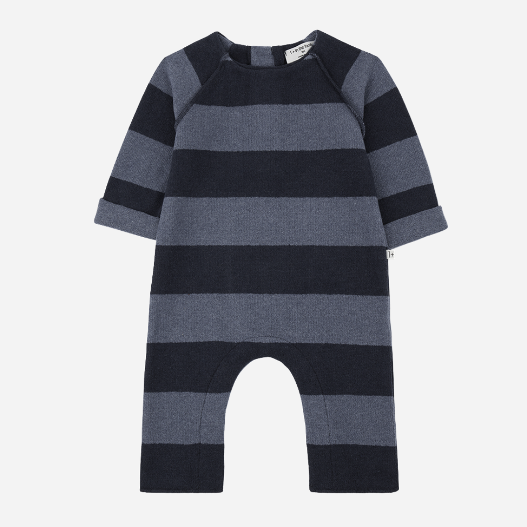 Sold at Bombon shop, designed by 1+ in the family – navy and grey striped baby jumpsuit with long sleeves and soft fabric, shown flat on white background front