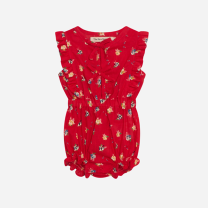 sold at Bombon, designed by The New Society red amapola floral baby romper with ruffle sleeves in 100% organic cotton matching sibling look