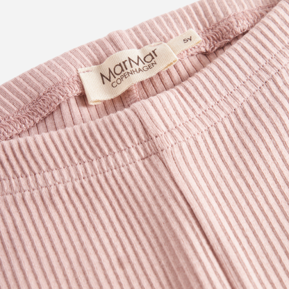 Sold at Bombon shop, designed by MarMar Copenhagen — blush pink ribbed organic cotton baby leggings, part of a matching set.